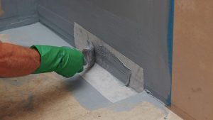 cheapest way to waterproof a bathroom
