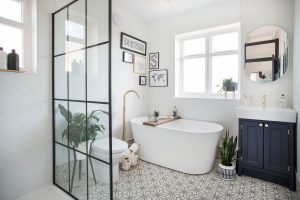 What is the cheapest way to waterproof a shower wall?